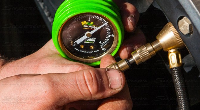 Closeup view of the Speedy Deflator and Gauge letting out some air pressure