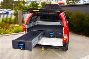 Rear view of a current model Holden Colorado with the MSA 4x4 Drawer System fitted with one drawer open showing all the storage area available in the draw